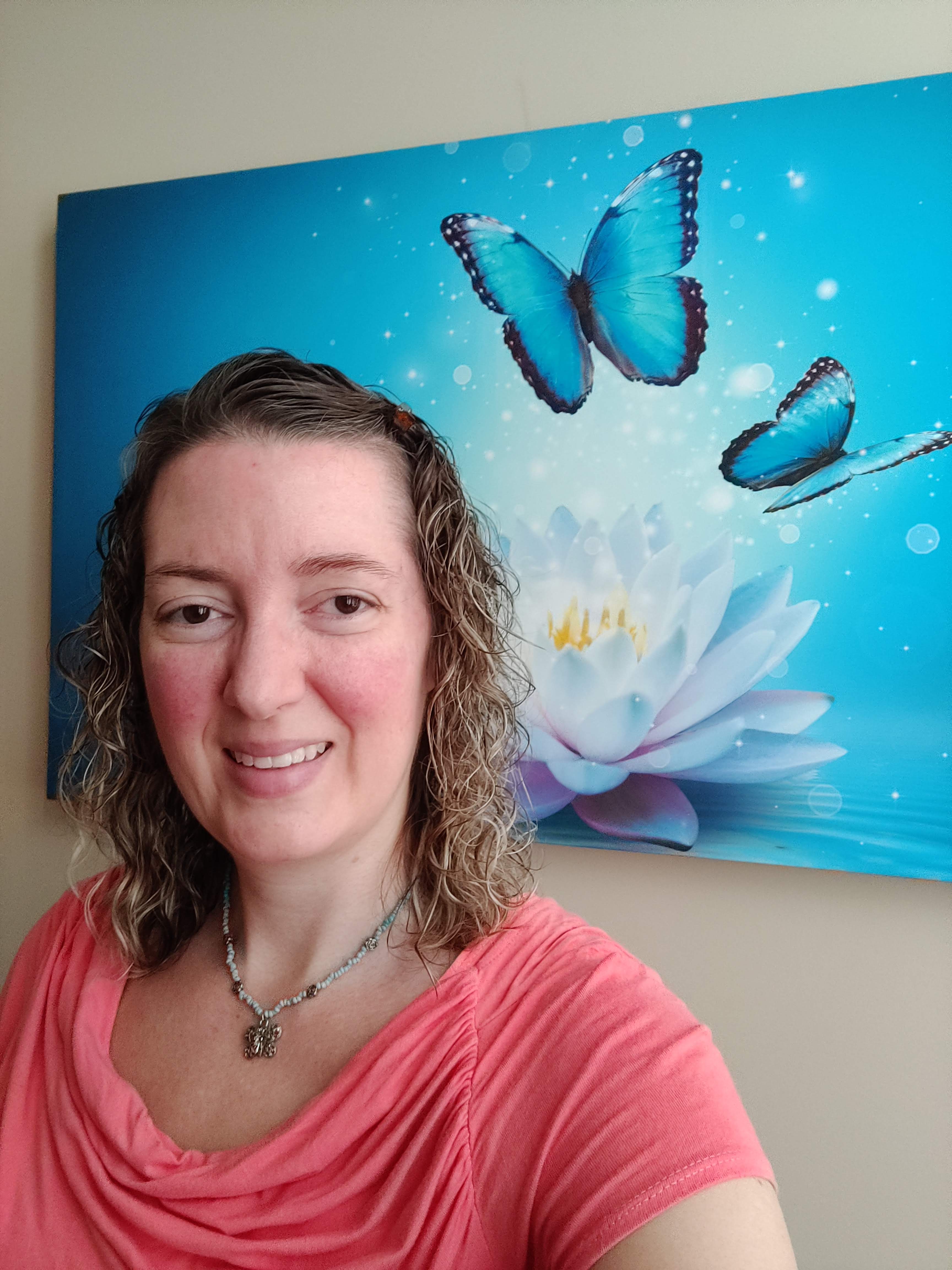 headshot of vanessa with blue butterflies